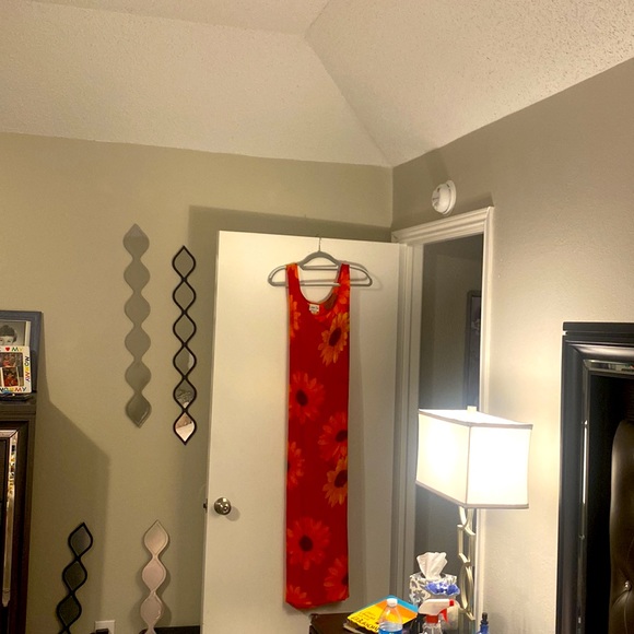 A maxi dress with Gold ,Orange and brown large flowers accenting the red! - Picture 2 of 3